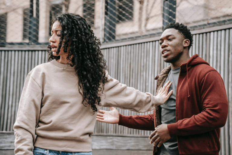 a woman telling her partner off after catching him cheating