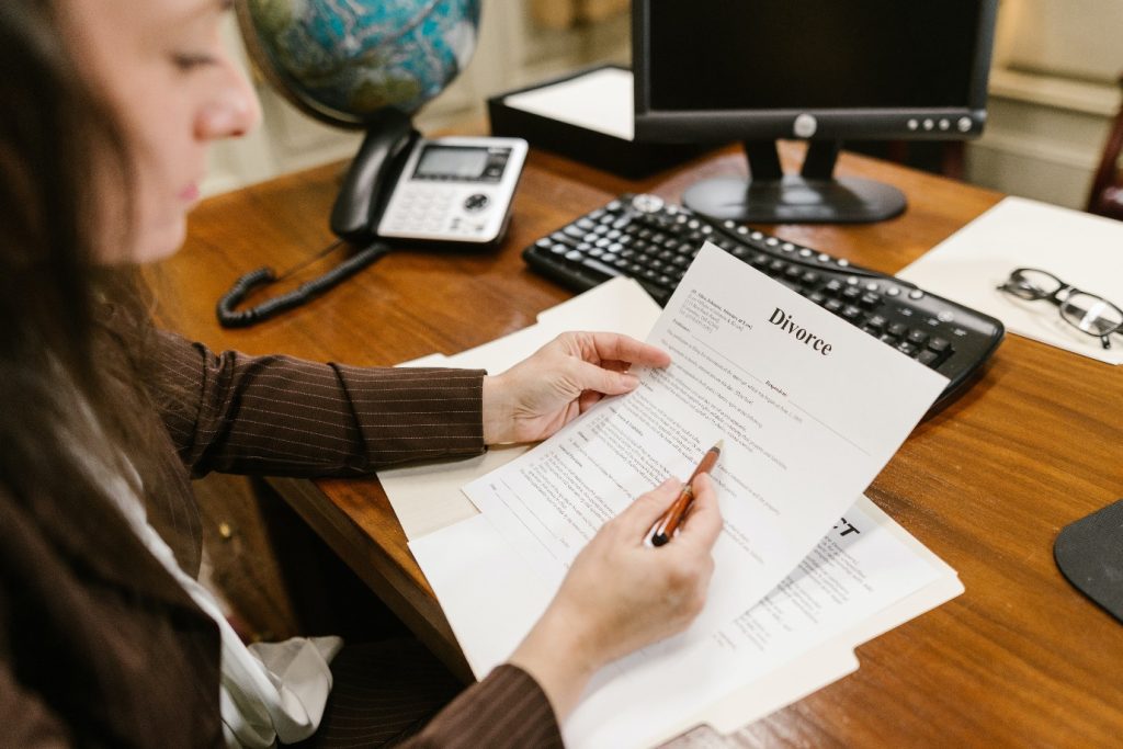 A family court lawyer holding divorce documents