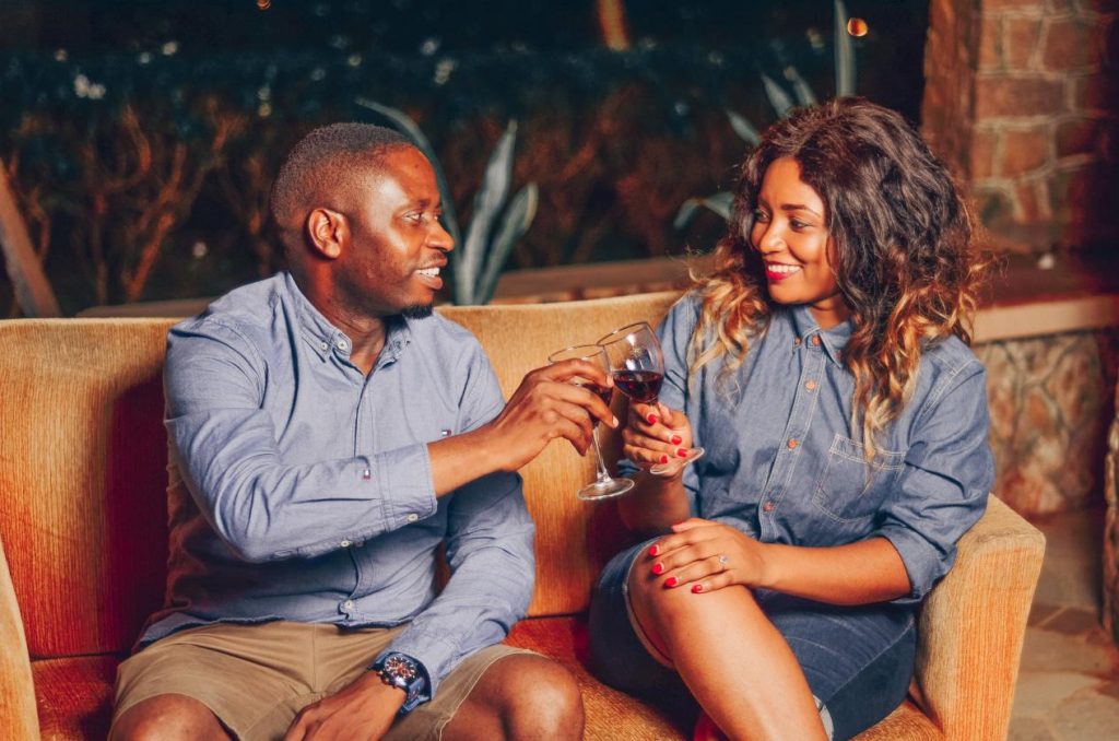 A couple toasting on wine