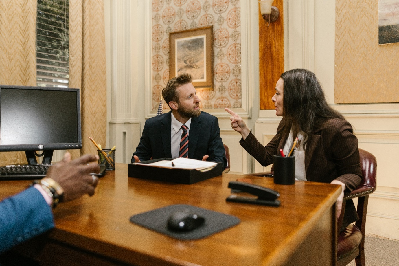 A couple having an argument at a lawyer’s office 