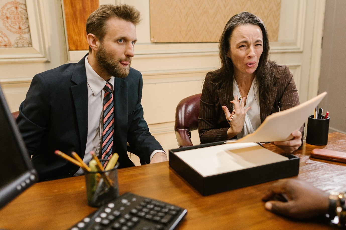 A woman having a discussion with divorce lawyers in Houston 