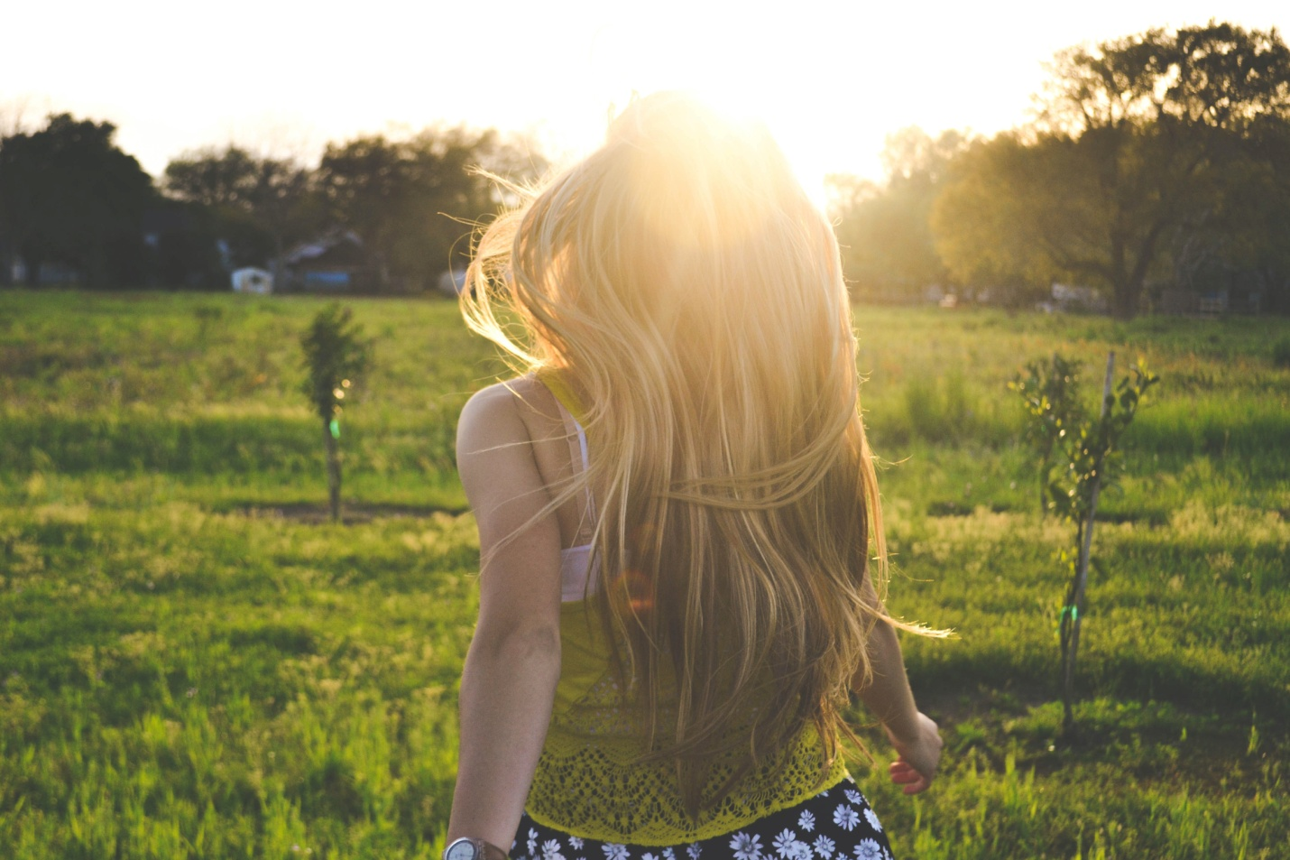 A woman walking in a field