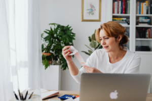  A woman looking at a receipt