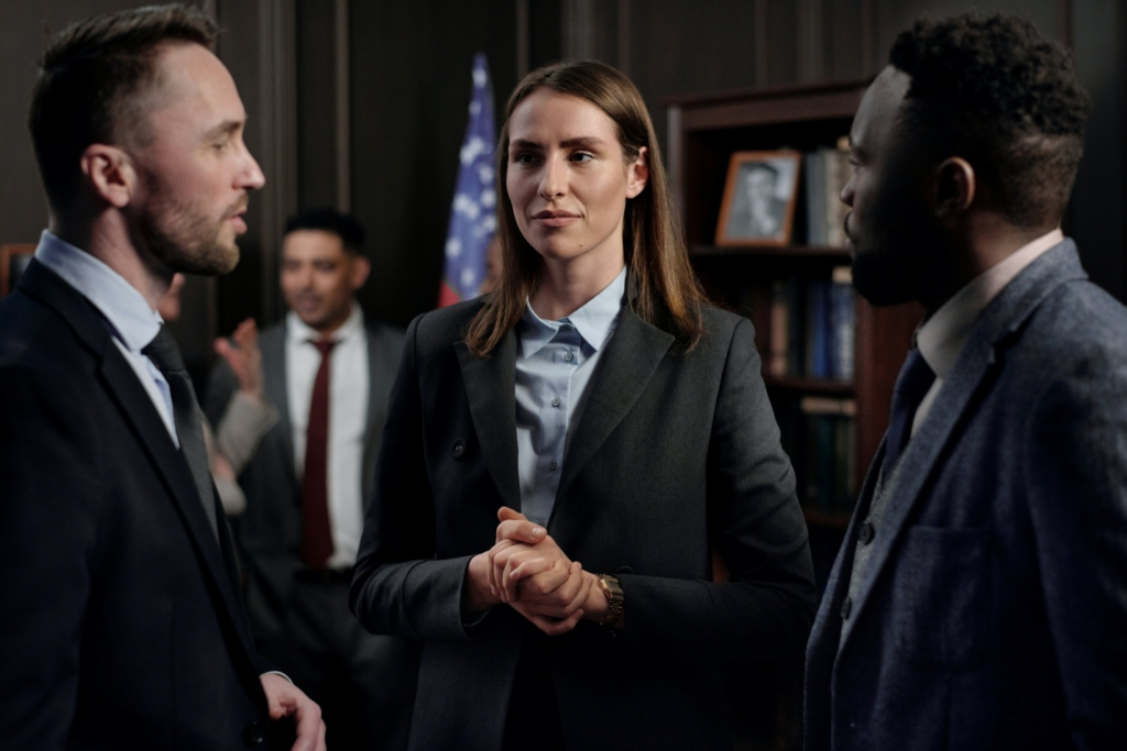 Three lawyers discussing a case