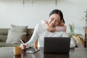 A woman working on a laptop