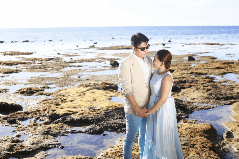 A couple posing for a photo