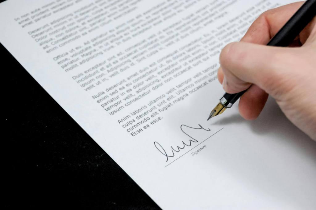 A person signing a document