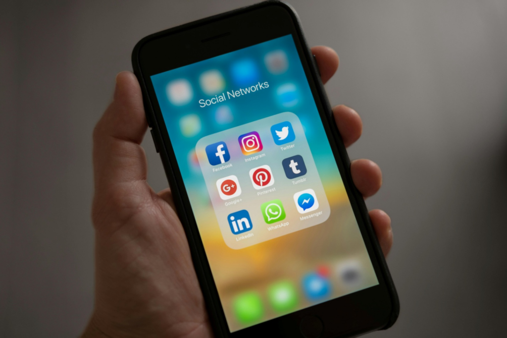 Icons of different social media apps on a phone screen