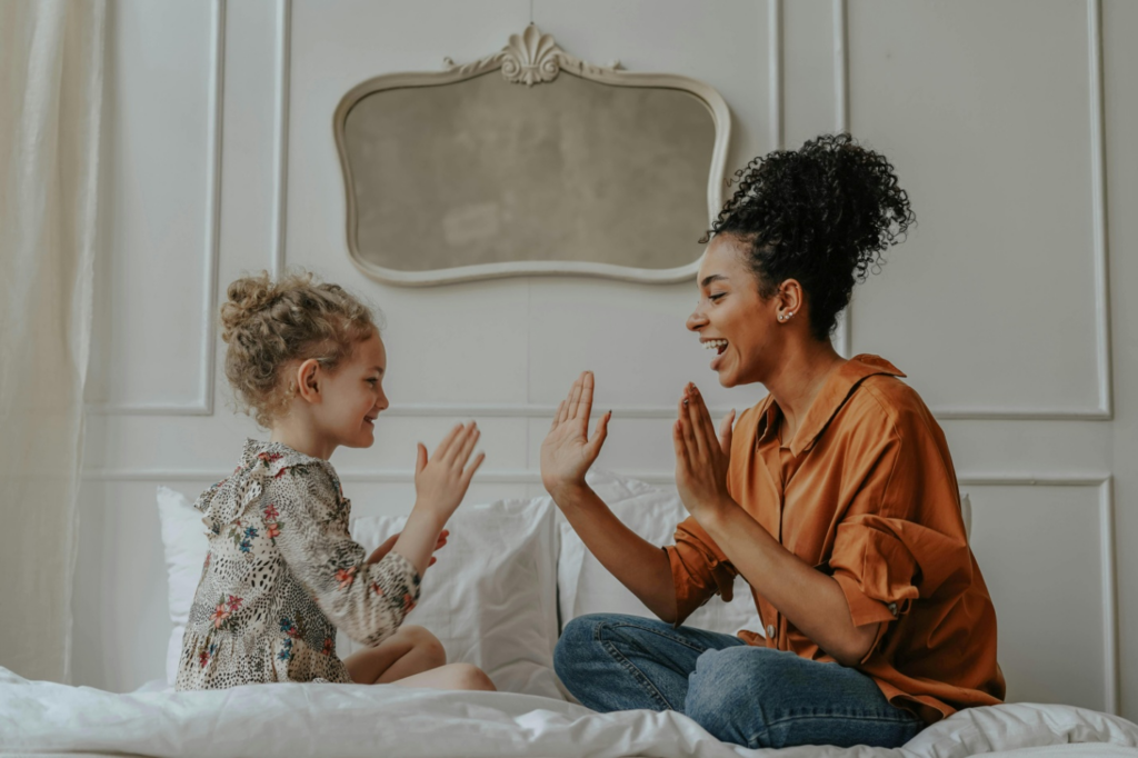 A mother playing with her daughter