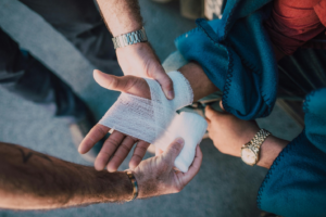 Person Getting Their Hand Bandaged 