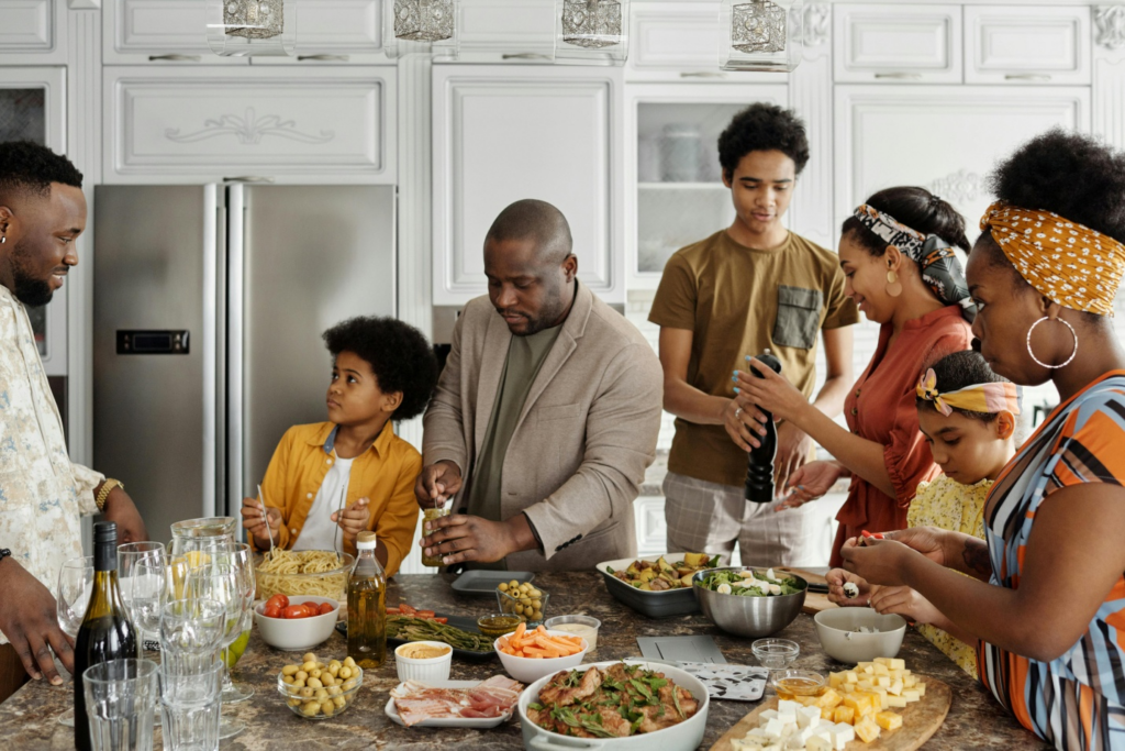 A big blended family preparing lunch together