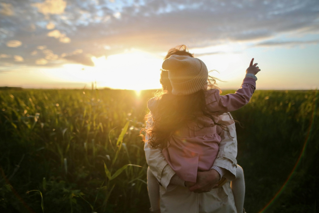 A person holding their child