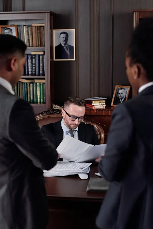 An image of lawyers in an office