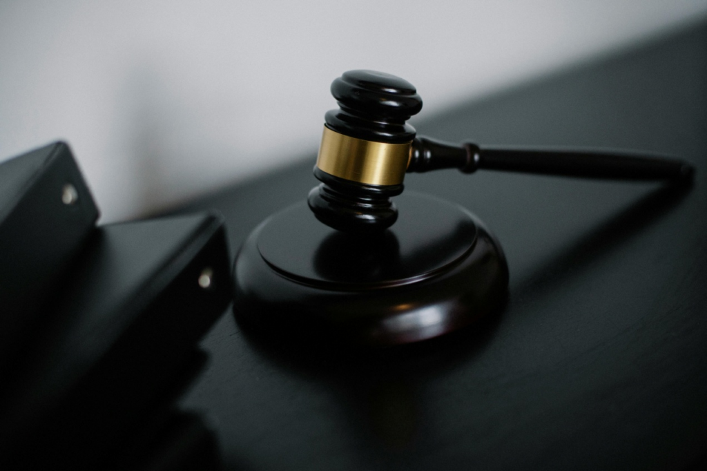 A wooden gavel on a desk