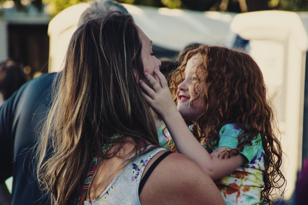 An image of a mother holding her daughter