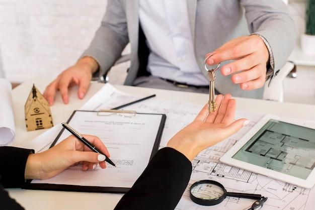 A couple reviewing asset division documents with a lawyer