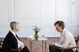  Attorney speaking with a client during a consultation about a contested divorce in Texas