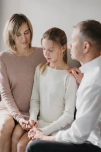 A child with her parents