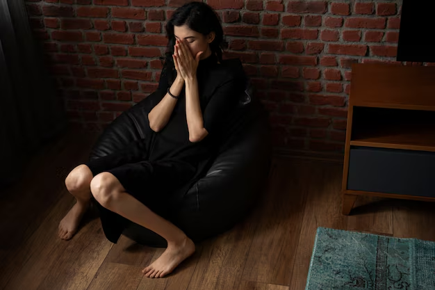 A woman sitting on a bean bag