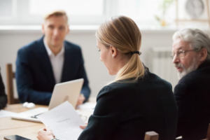 Lawyer discussing visitation rights and custody matters with a client in a legal office