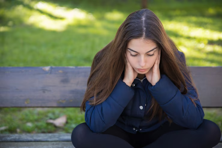 A woman sitting on a bench