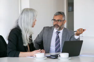 Divorce lawyer discussing legal options with a client during a post-divorce consultation