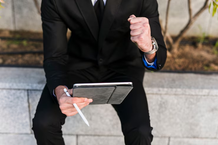 A CPS attorney holding a pen and a tablet