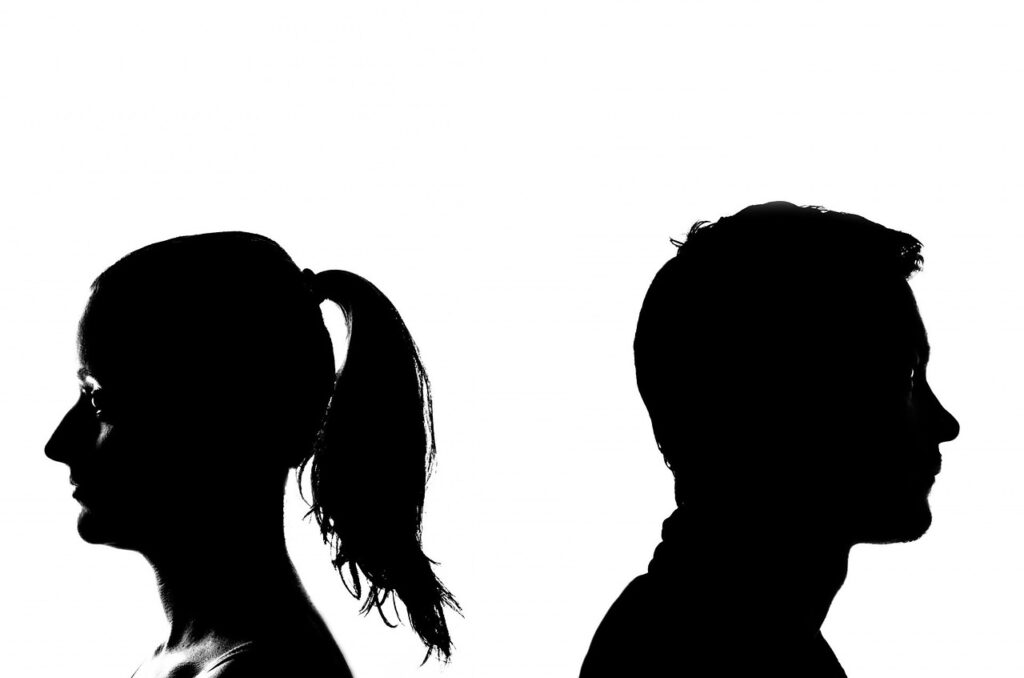 Two people facing opposite directions