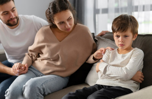Sad child with parents