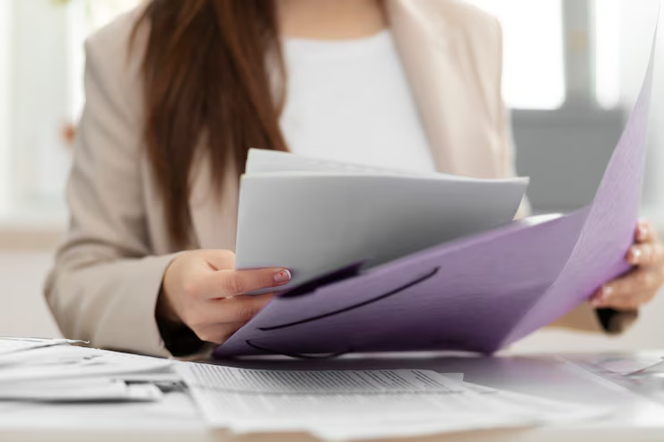 A woman reading a document