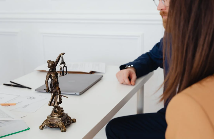 Couple consulting with a divorce lawyer, considering an uncontested divorce