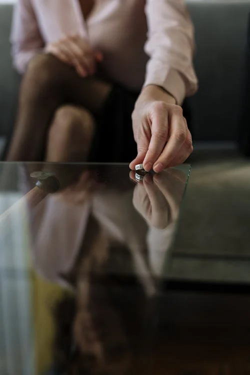 A woman leaving her wedding ring