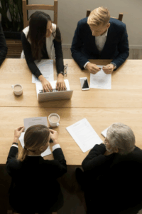 People sitting across a table