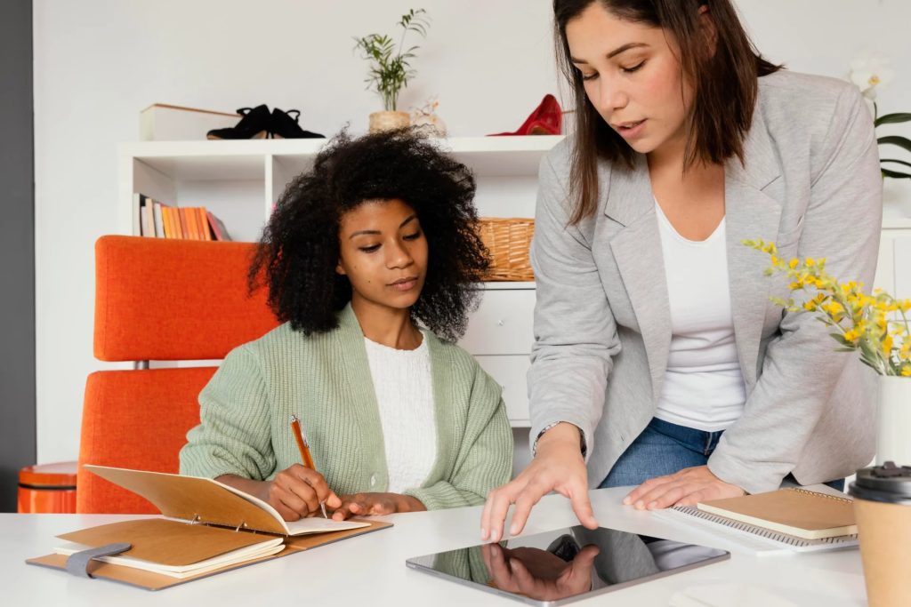 Two women discussing a case
