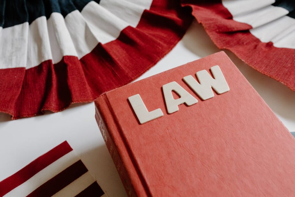 Close-up shot of a law book open on a wooden surface.