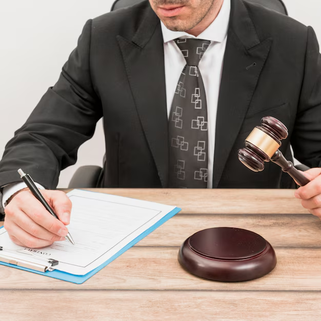 A family lawyer signing a document