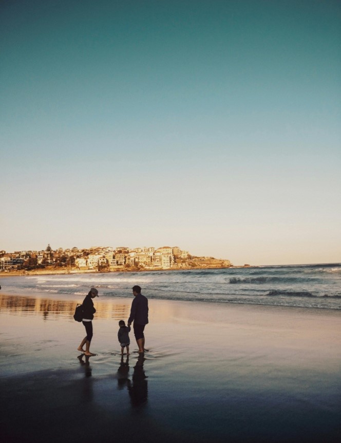 Parents with their child on the seashore