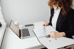 A lawyer examining records related to Houston child custody modification attorney services.