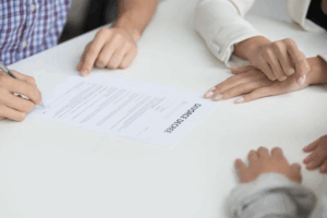 Parents discussing child custody arrangements with a lawyer