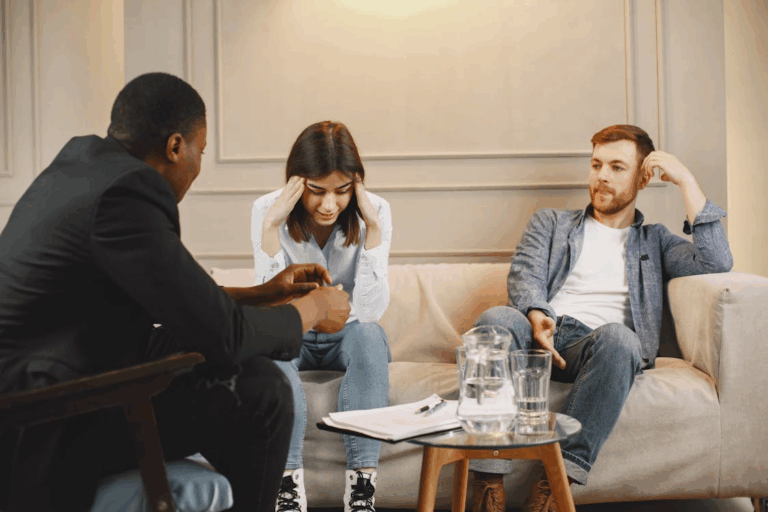 Couple in session with Houston mediation attorney discussing family law dispute.