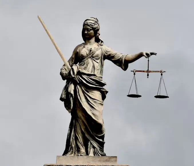 Scales of justice symbolizing fairness and representation from an experienced family law attorney in Kingwood, TX, handling divorce, custody, and support cases in Harris County.