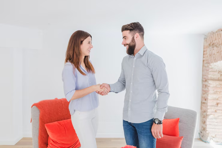 A couple shaking hands