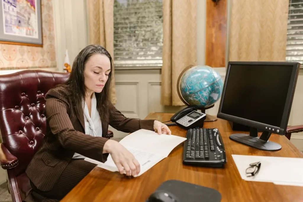 divorce lawyer in Pasadena working in her office.