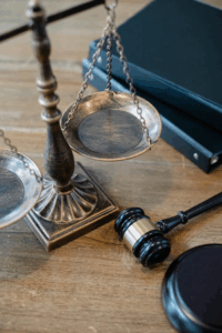 A scale and a wooden gavel