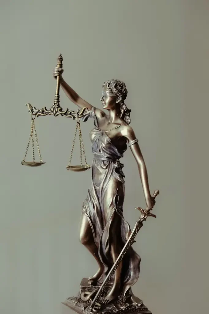Scales of justice figurine representing fairness in divorce and custody cases in Tarrytown, TX