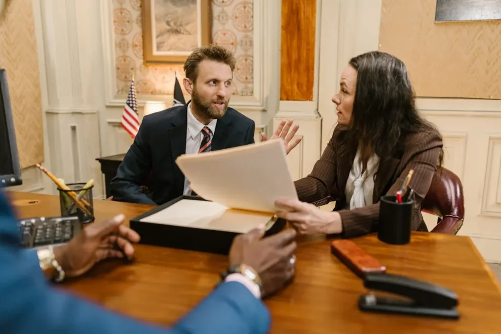 A couple argues in the office of a divorce attorney in Orange.