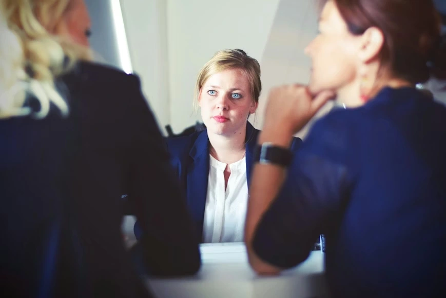 A family law attorney in Lucas meets with clients in the office.