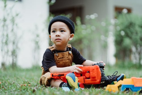 A child sitting in a playground