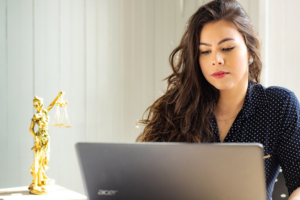 A woman working on a laptop