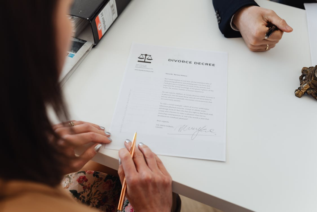 A person reading divorce decree papers